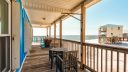 Blue Sky Breeze Covered Outdoor Living Area with Gulf View