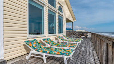 Bask in the sun on ocean front deck