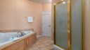 020 East Shared Bathroom Sunscape Full Bathtub and Shower Stall
