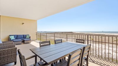 022 - Beach Bum Covered Balcony Outdoor Dining Space